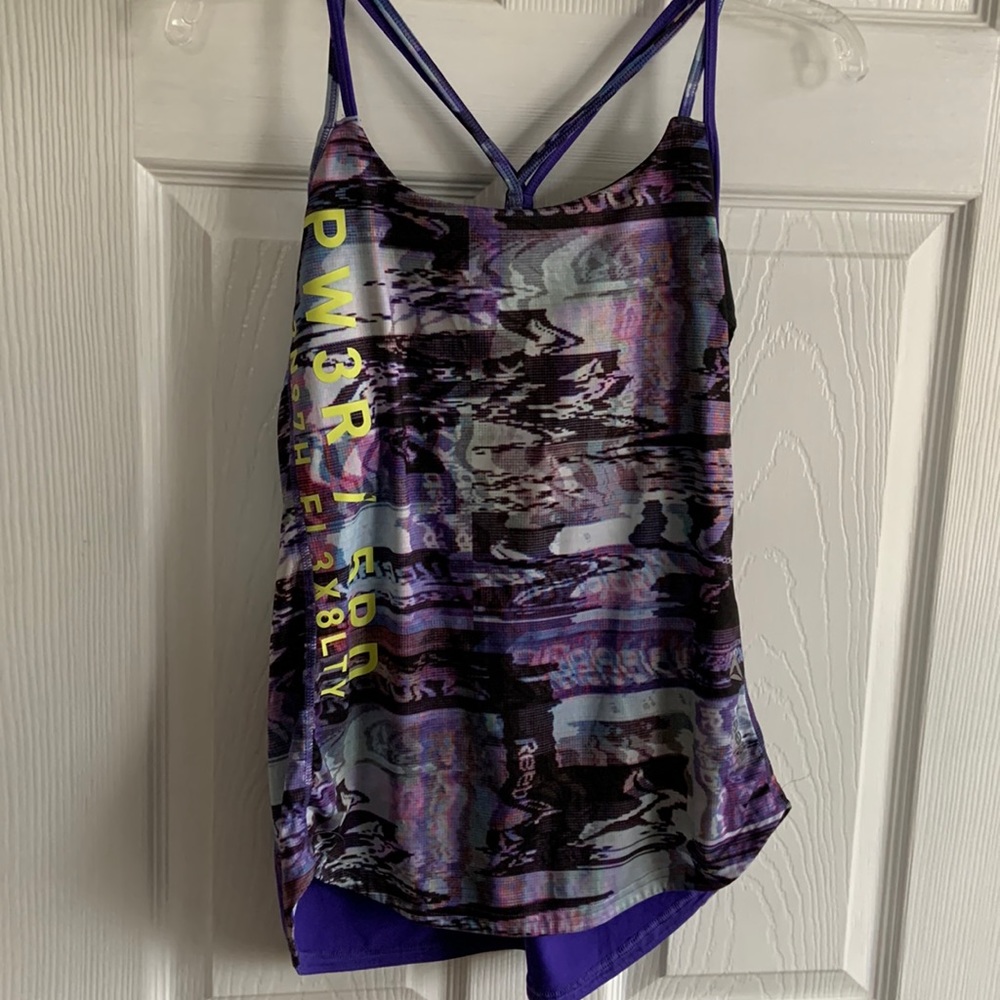 Reebok workout/ running wear. Like new. No signs of wear. Extra bonus top